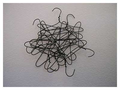 lisa solomon art - pile of small hangers