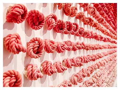 lisa solomon art - Senninbari [1000 stitch knot belt], Installed at Walter Maciel Gallery, 2016, hand dyed cotton rope, 122  x 299 inches this configuration