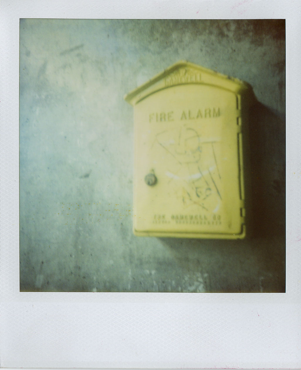 polaroid yellow fire alarm